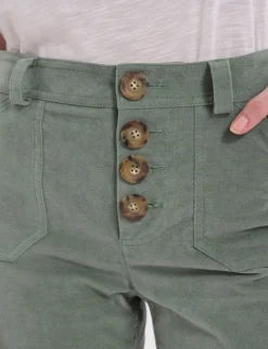 Charlotte trousers in almond green smooth velvet