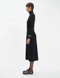 Divine black turtleneck dress with white trim