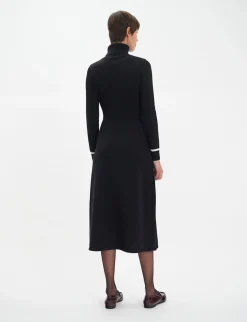 Divine black turtleneck dress with white trim