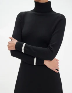 Divine black turtleneck dress with white trim