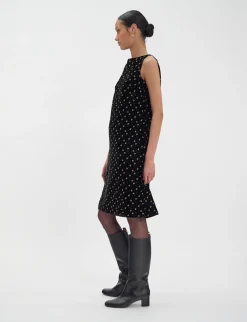 Madeleine dress in smooth black velvet with gold print