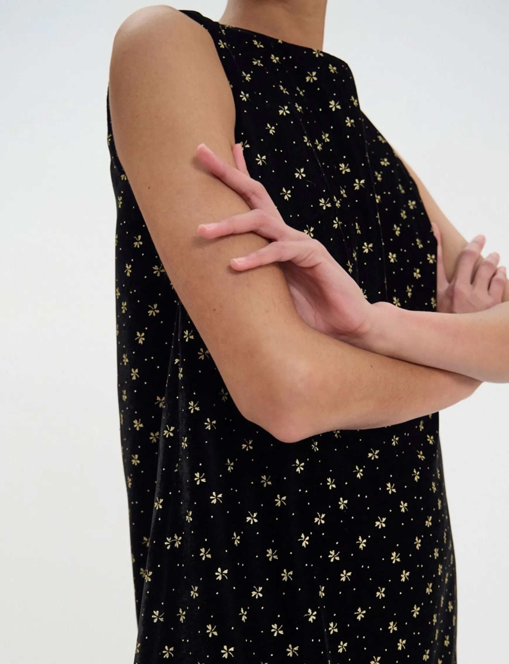 Madeleine dress in smooth black velvet with gold print