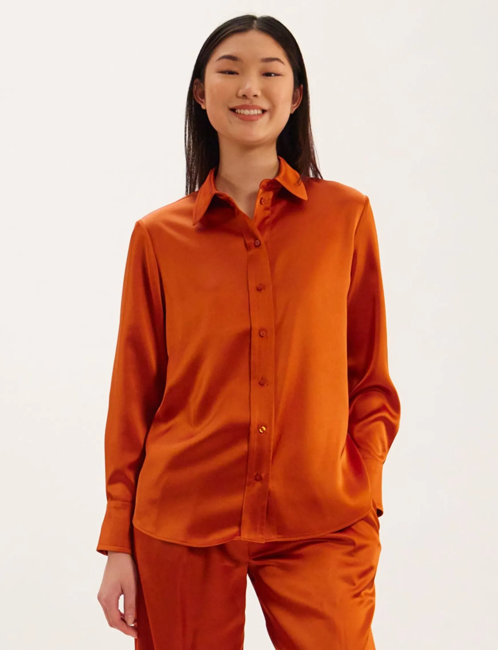 Maureen burnt orange shirt