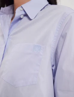 Maureen light blue shirt